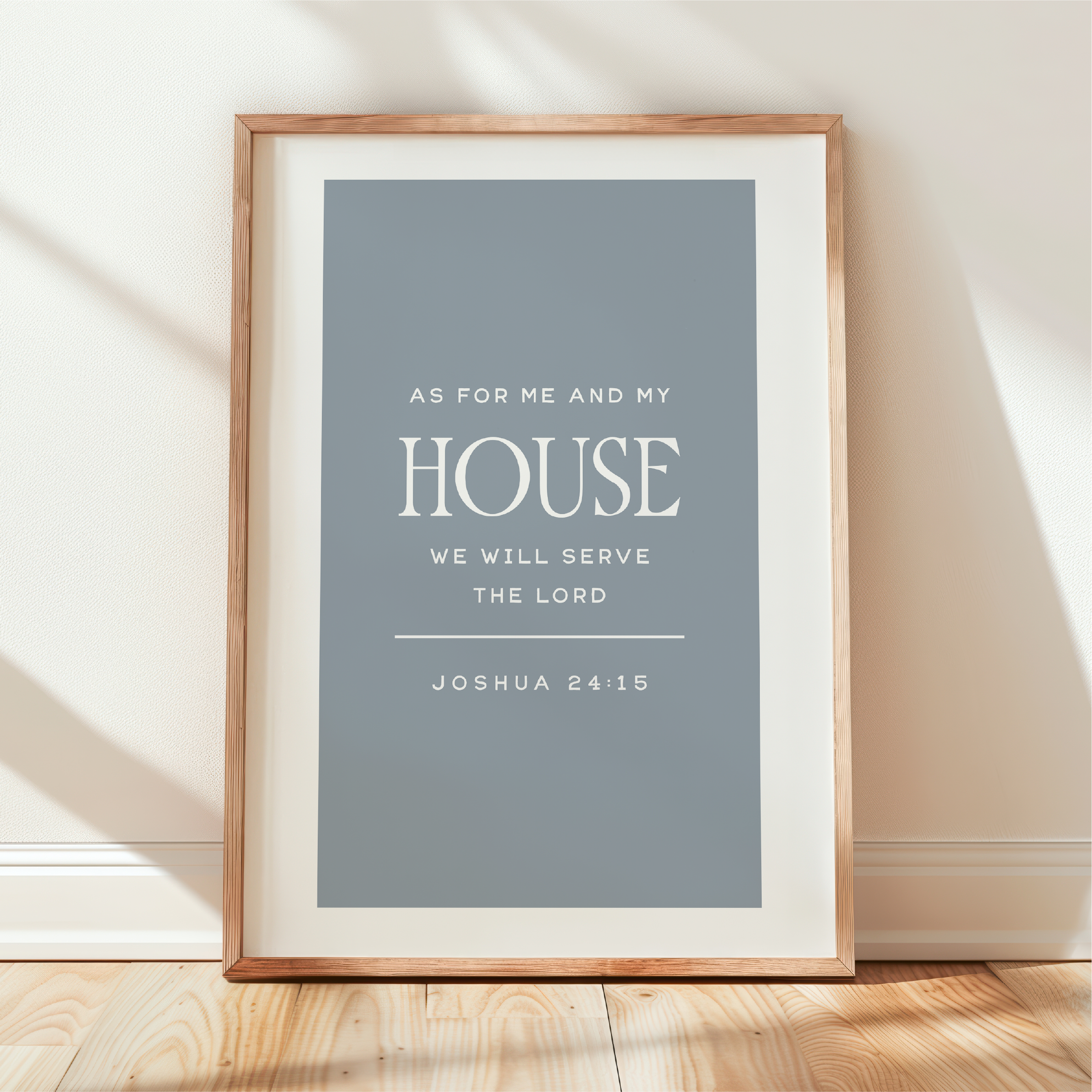 Framed print with inspirational quote on a wall