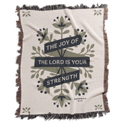 Blanket with floral design and text 'The Joy of the Lord is Your Strength' on a white background