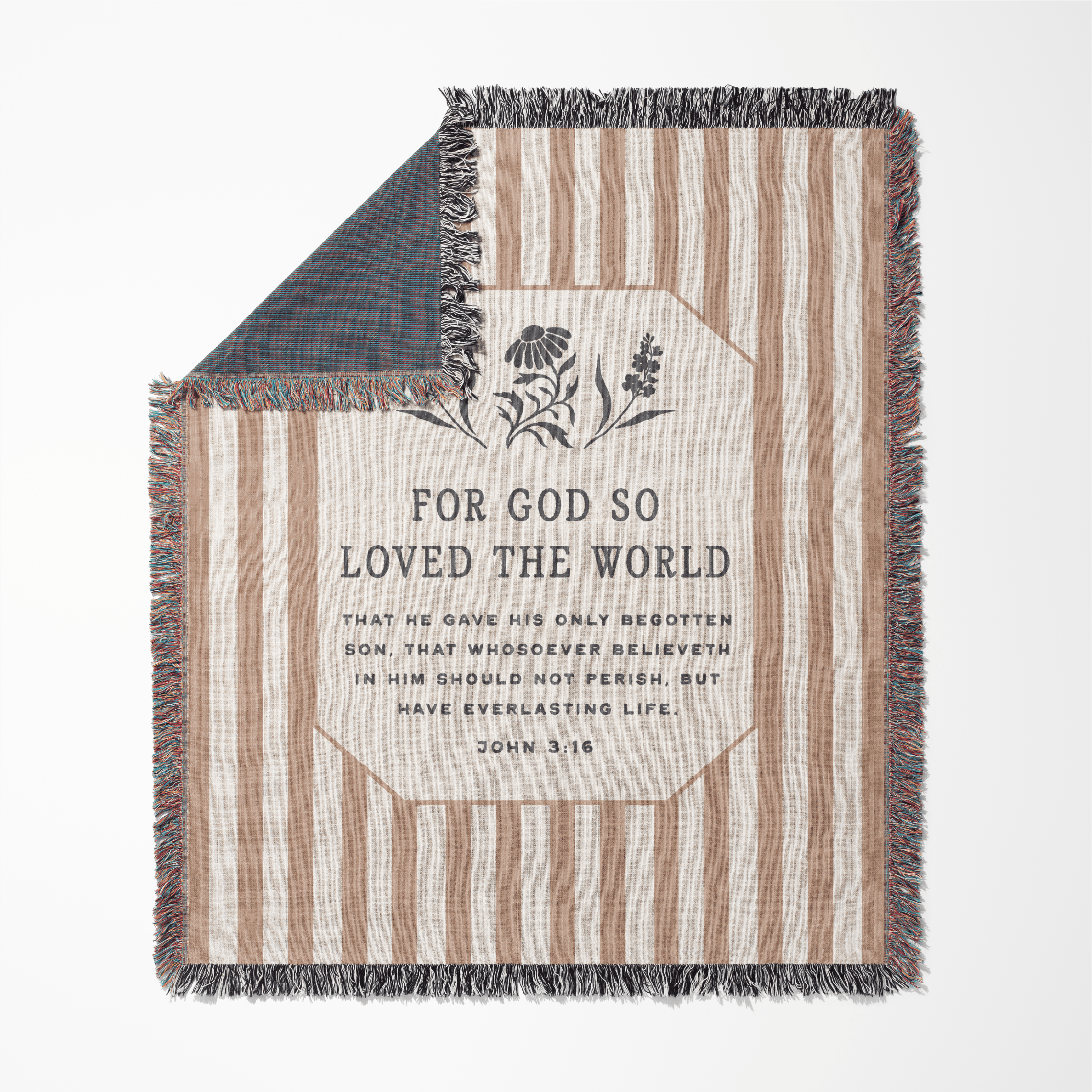 Striped blanket with text and floral design on a white background