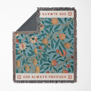 Decorative blanket with floral pattern and 'God Always Provides' text on a white background