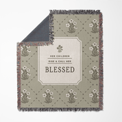 Blanket with floral pattern and text on a white background