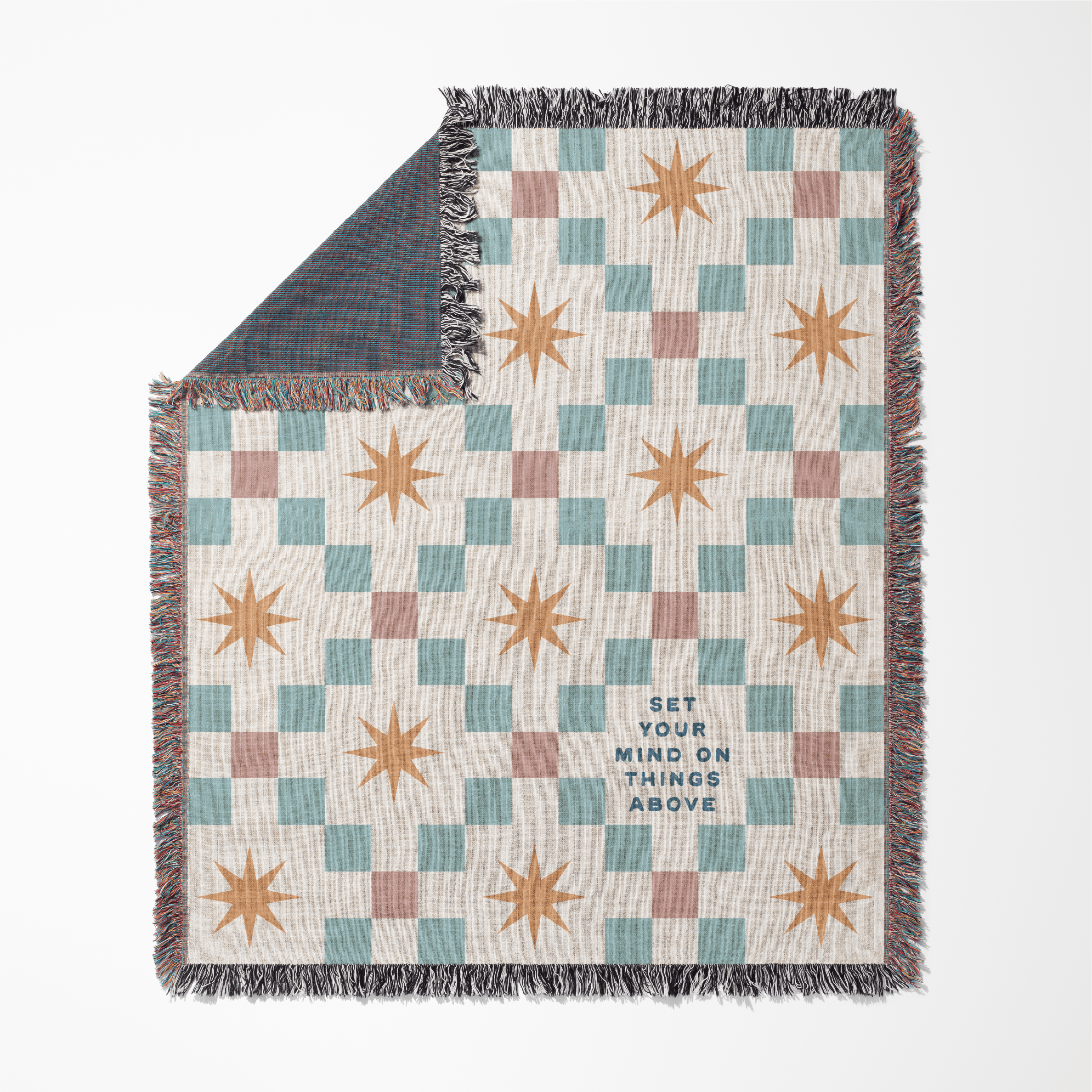 Checkered blanket with star patterns and text on a white background