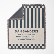 Striped blanket with text and branding on a white background