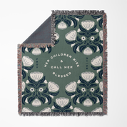 Floral patterned blanket with text on a white background