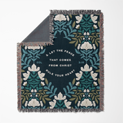 Floral patterned blanket with text on a white background