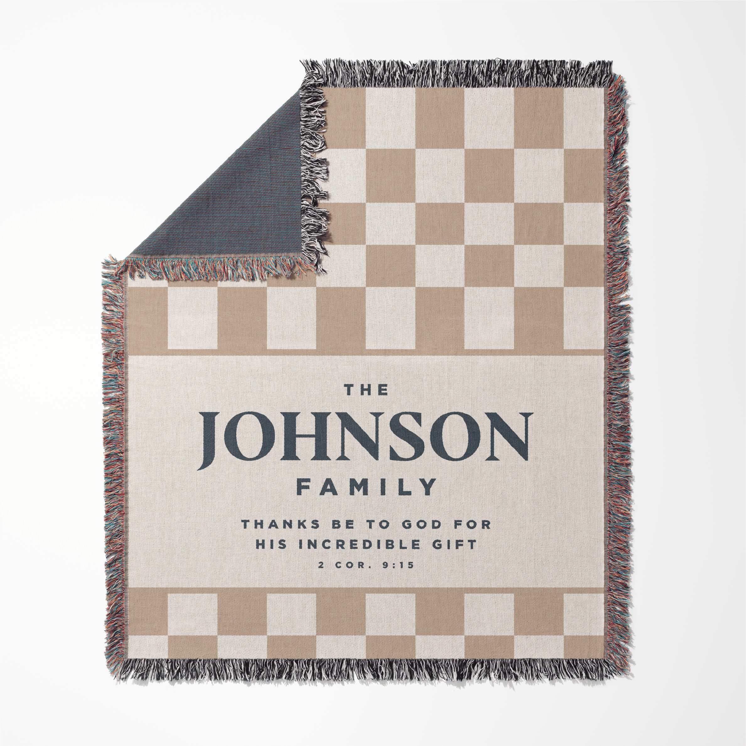 Checkered blanket with 'The Johnson Family' text on a white background
