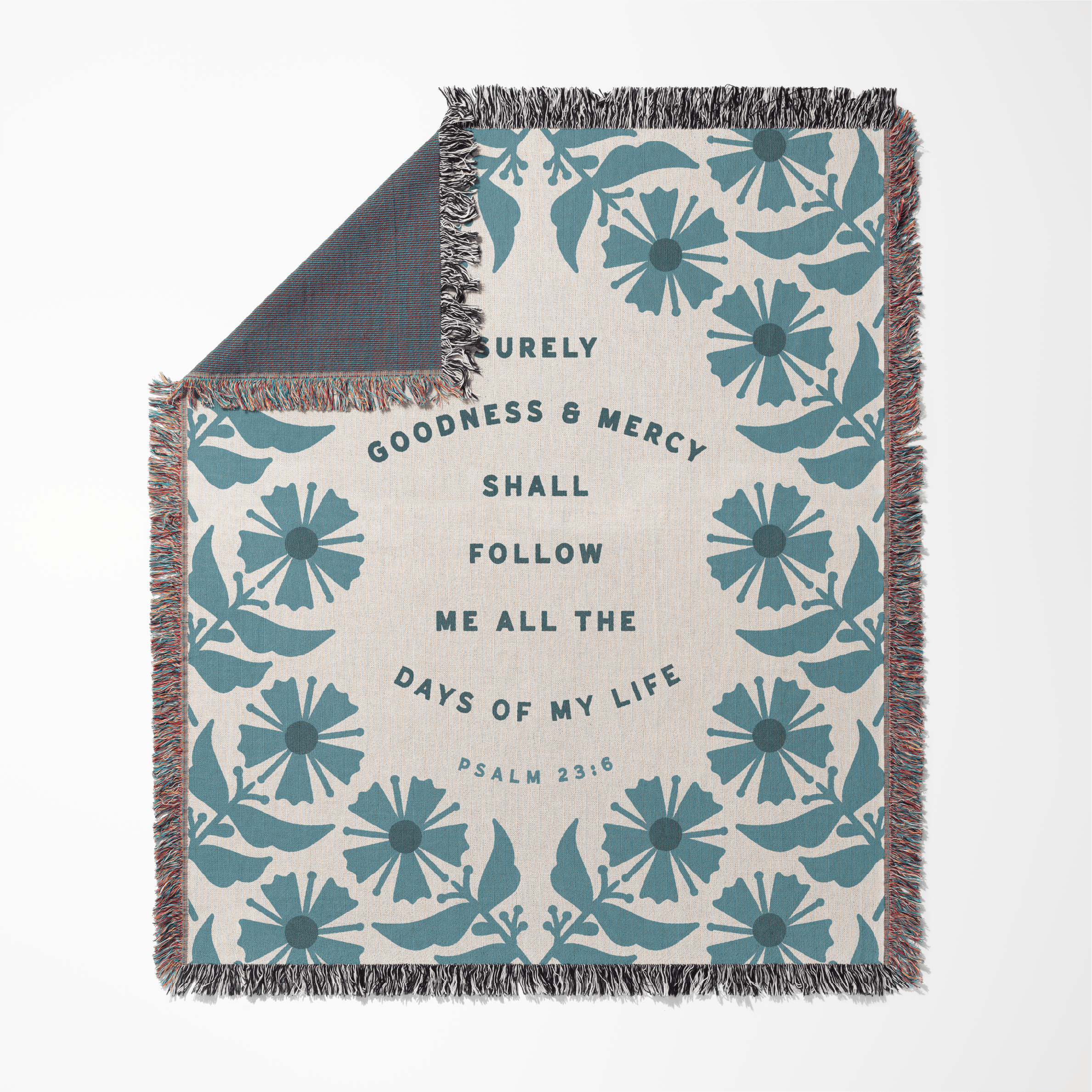 Floral patterned blanket with text on a white background