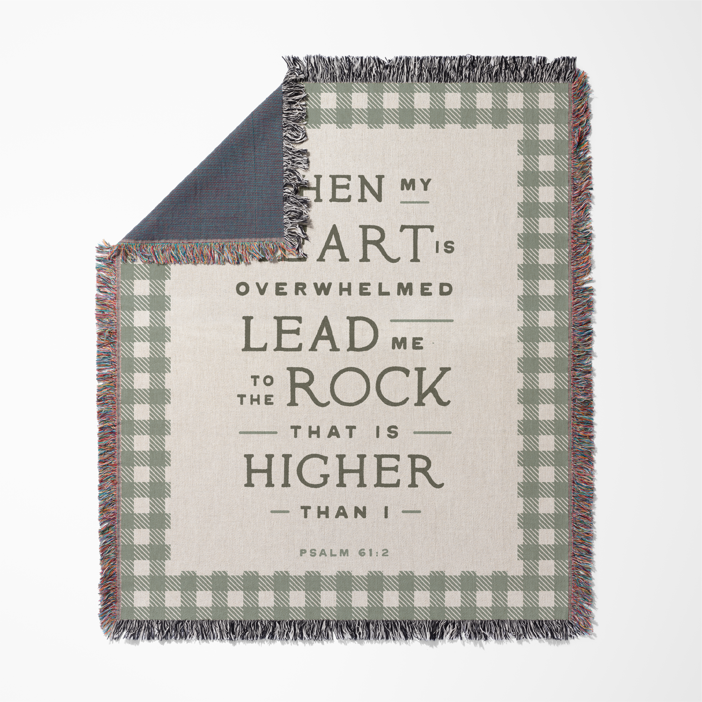 Blanket with motivational quote and plaid pattern on a white background