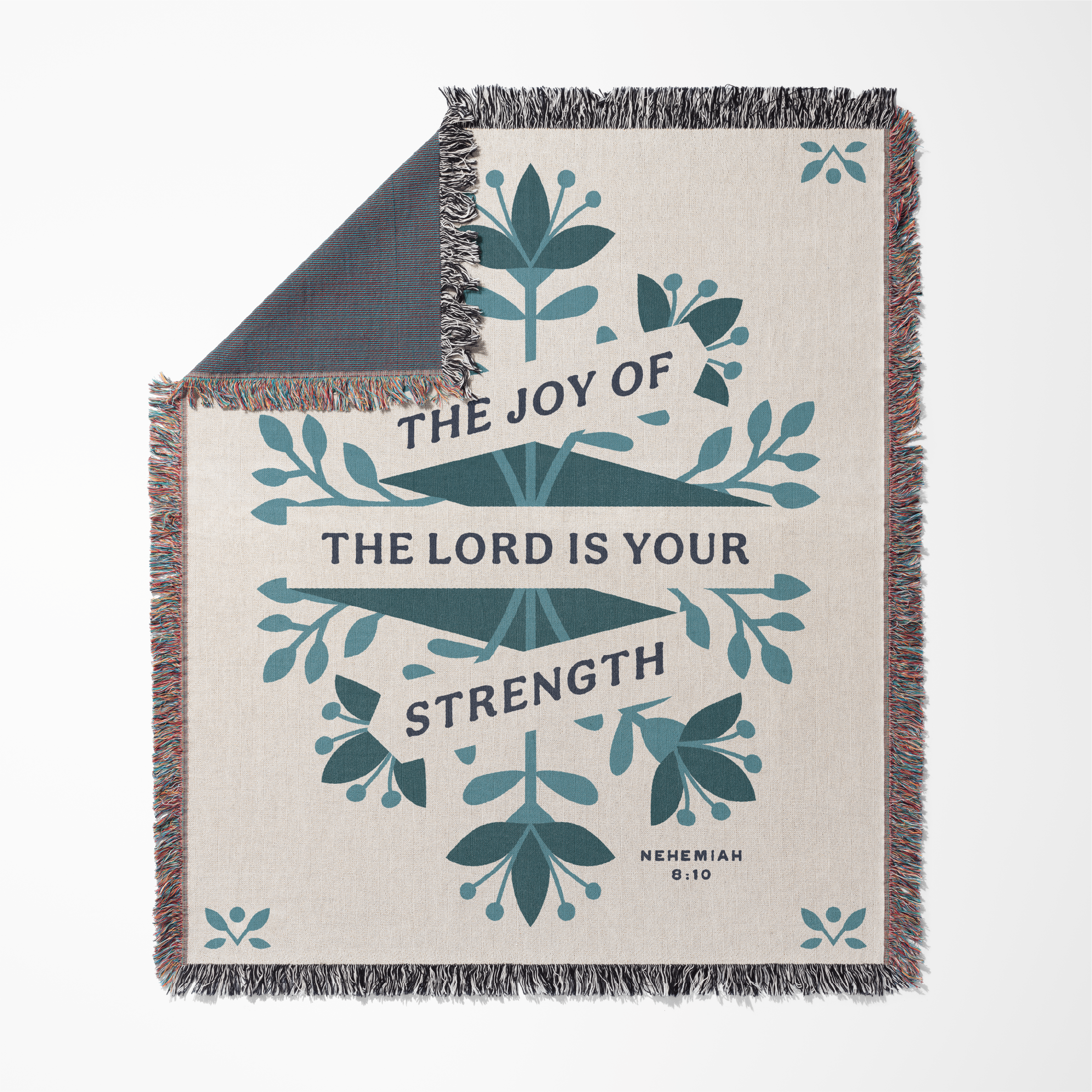 Blanket with 'The Joy of the Lord is Your Strength' text and floral design on a white background