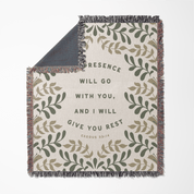 Blanket with leaf pattern and text on a white background