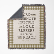 Blanket with plaid pattern and text on a white background