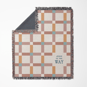 Checkered blanket with 'Jesus is the Way' text on a white background