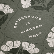 Text 'Motherhood is Kingdom Work' surrounded by floral patterns on a green background