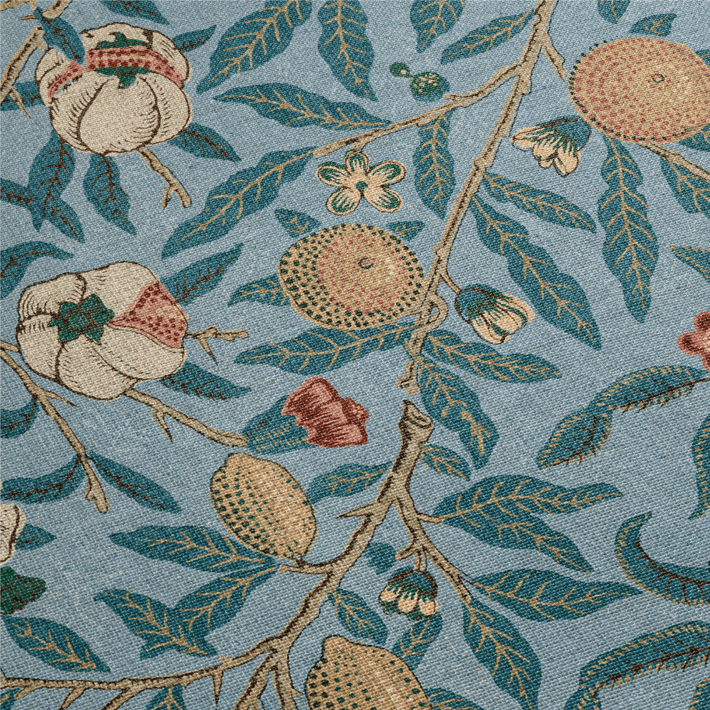 Patterned fabric with pomegranate design on a blue background