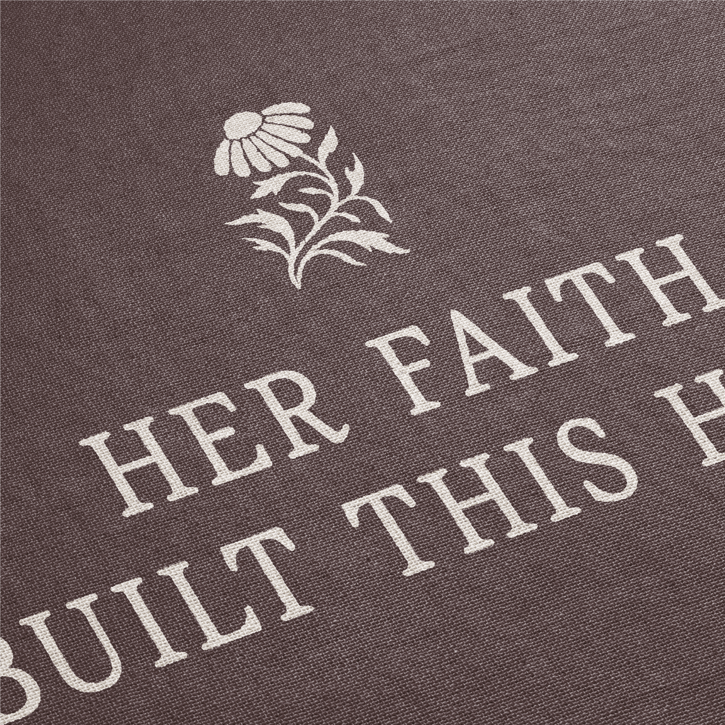 Text 'HER FAITH BUILT THIS HOUSE' with a floral design on a brown background