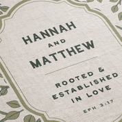 Text overlay with 'Hannah and Matthew' and Bible verse on a textured background with leaf patterns.