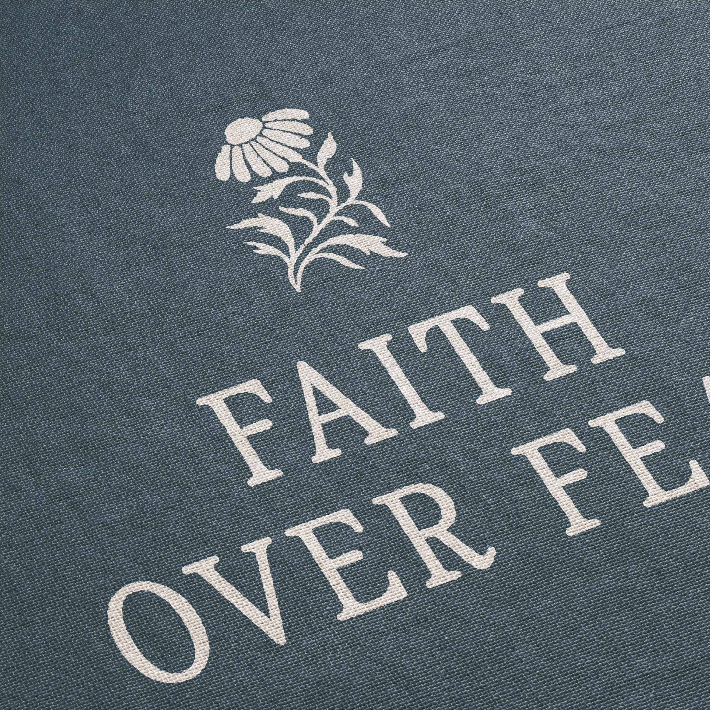 Text 'FAITH OVER FEAR' with a floral design on a dark blue background