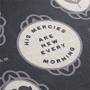 Text 'His mercies are new every morning' on a circular design with decorative elements.