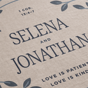Personalized fabric with 'Selena and Jonathan' and Bible verse on beige background