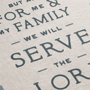 Textured fabric with printed text on a neutral background