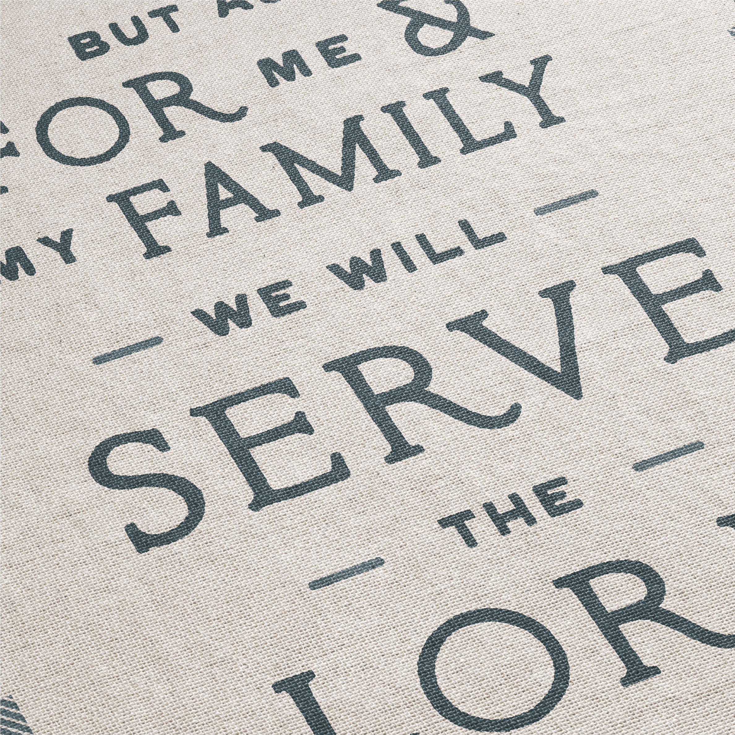 Textured fabric with printed text on a neutral background