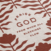 Text 'Praise God from whom all blessings flow' with floral and cross design on beige background