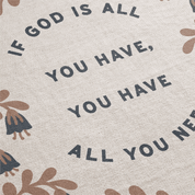 Text on a fabric background with floral patterns