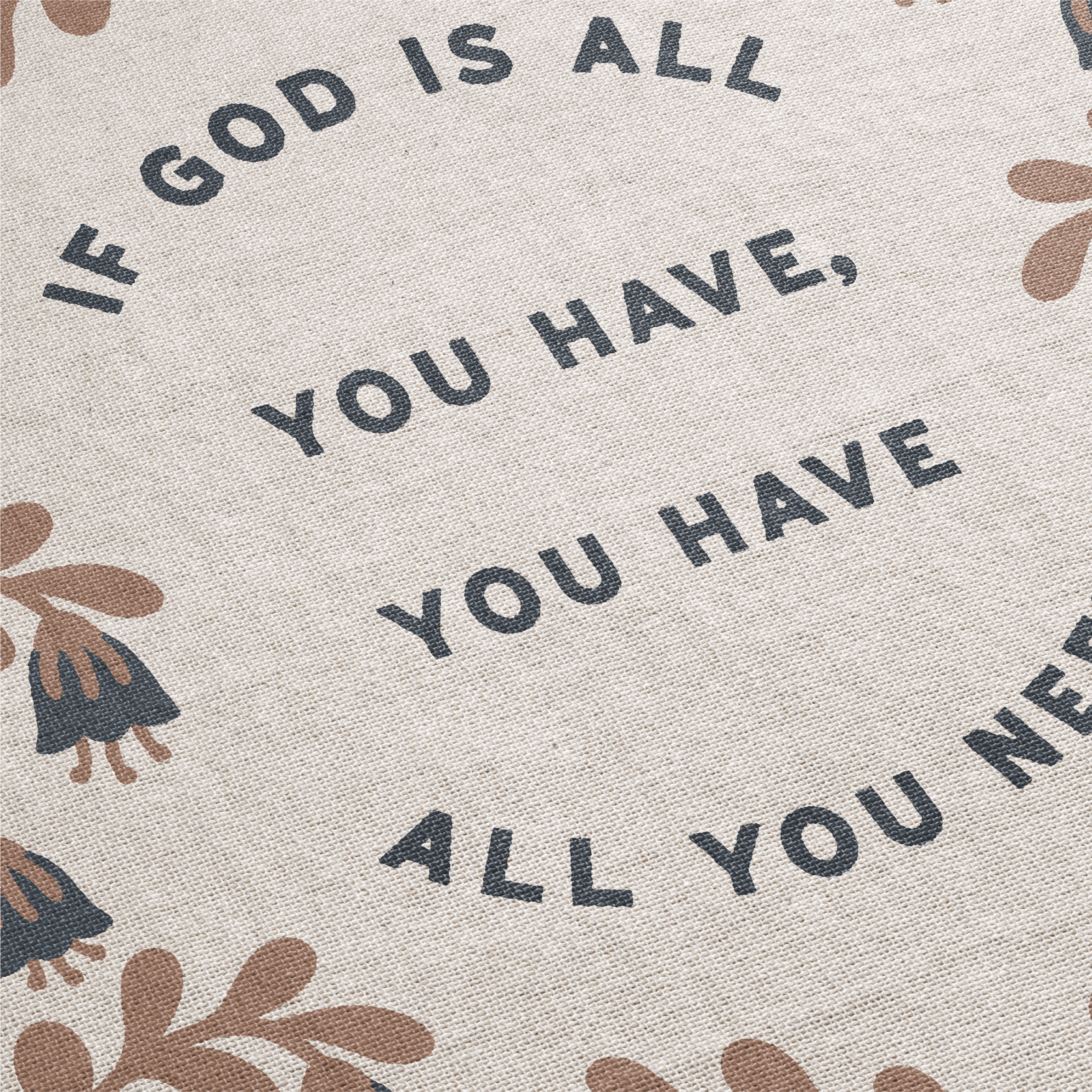 Text on a fabric background with floral patterns