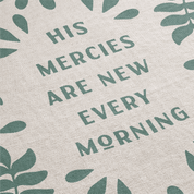 Text 'His mercies are new every morning' with leaf patterns on a light background