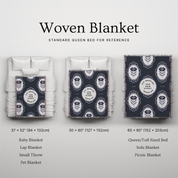 Woven blanket with different size options displayed on a bed for reference.