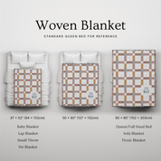 Woven blanket with size chart on a light gray background