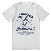 Christian t-shirt with the words “Redeemed. Saved. Restored.” displayed in clean, modern typography—faith-based apparel celebrating identity in Christ.