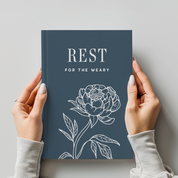 Book titled 'Rest for the Weary' with a floral design on a gray background