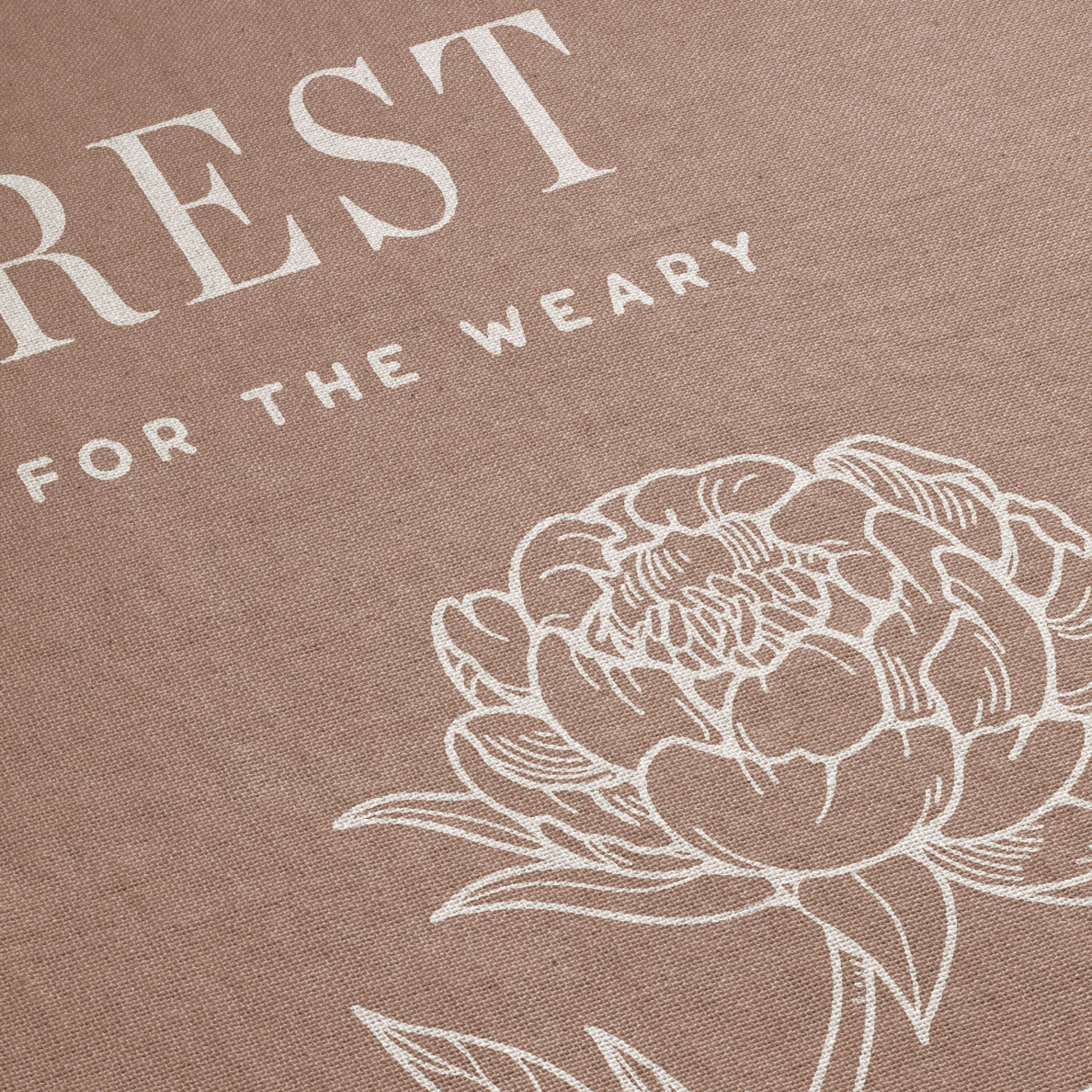 Brown fabric with white floral design and text 'REST FOR THE WEARY'.