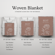 Woven blanket with 'REST FOR THE WEARY' text and floral design, shown on a bed for reference.
