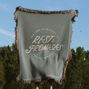Green blanket with text 'The Lord is faithful to rest in His promises' against a natural background