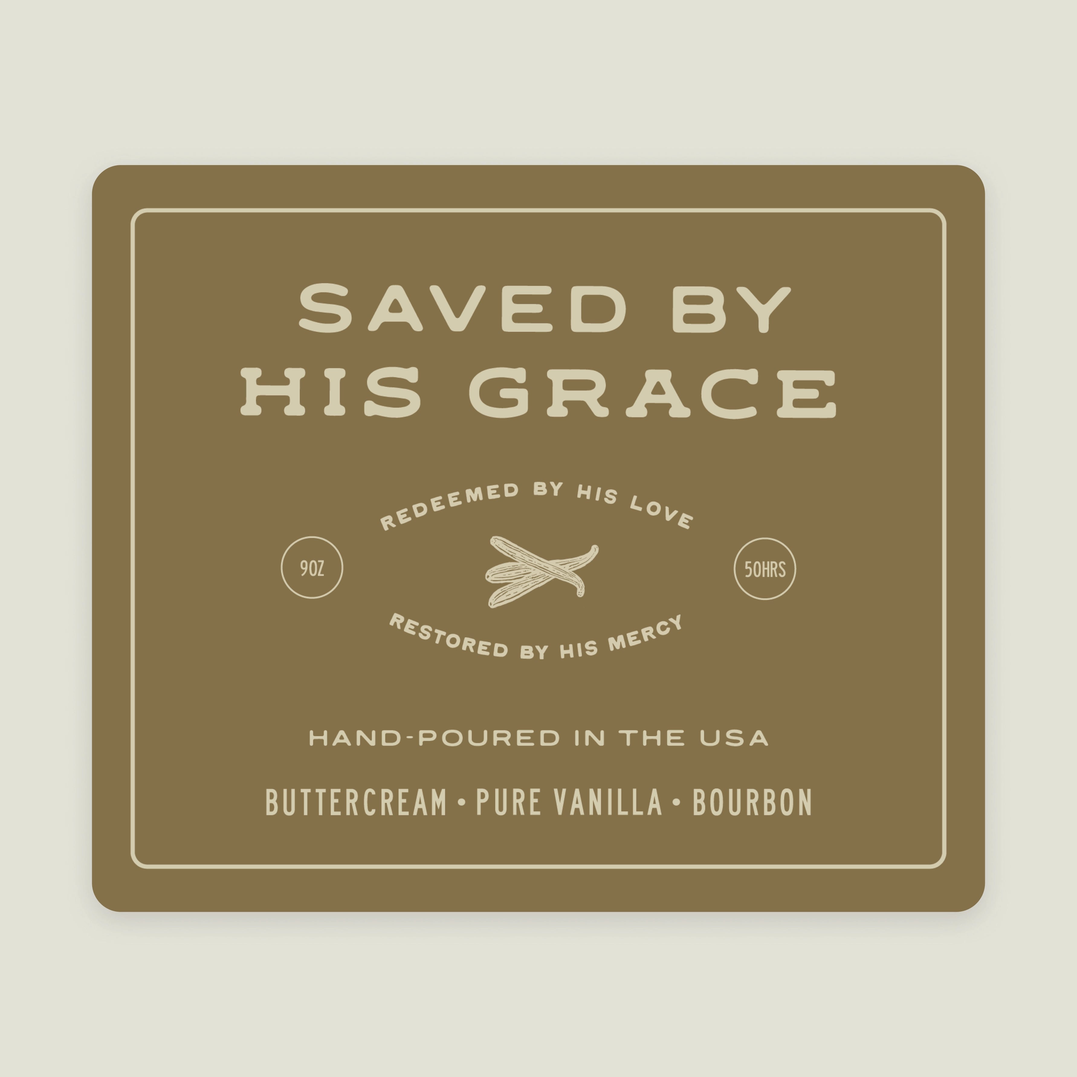 White jar candle labeled “Saved by His Grace” with a gold lid. Vanilla bean scent and Christian message—faith-filled gift celebrating God’s redeeming love.