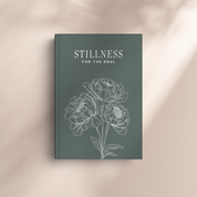Book titled 'Stillness for the Soul' with floral design on a beige background