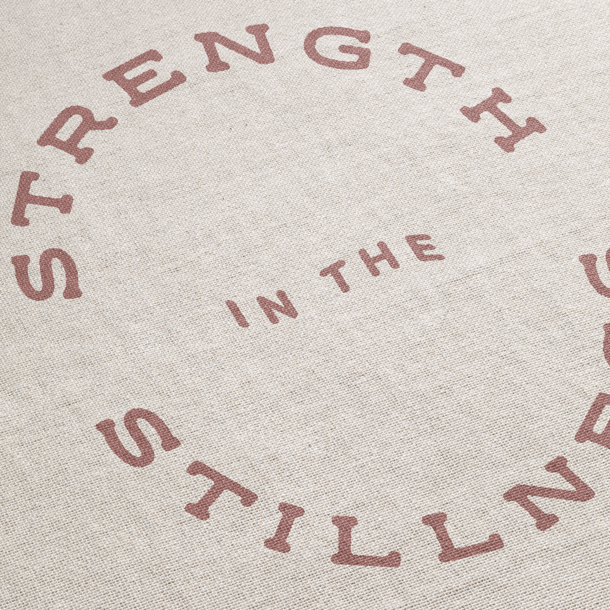 Text 'STRENGTH IN THE STILLNESS' on a textured beige background
