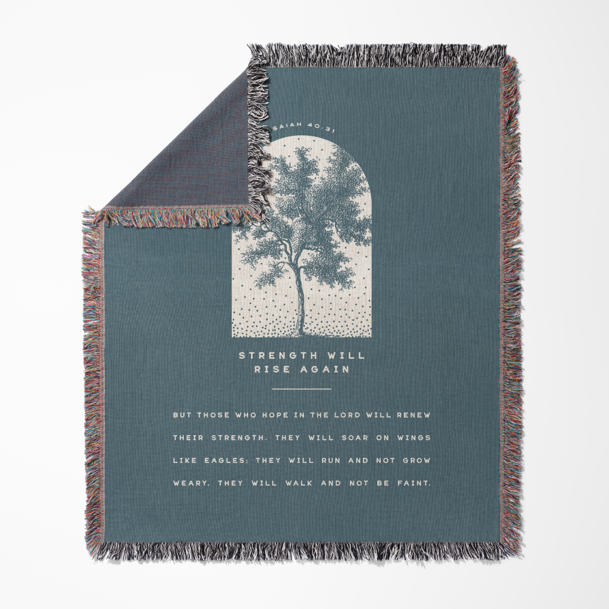 Blanket with tree design and text on a blue background