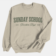Christian crewneck sweatshirt with the phrase “Sunday School Devotion Dept. – God’s Truth” in varsity-style lettering; cozy unisex cotton-poly blend for faith-based everyday wear.