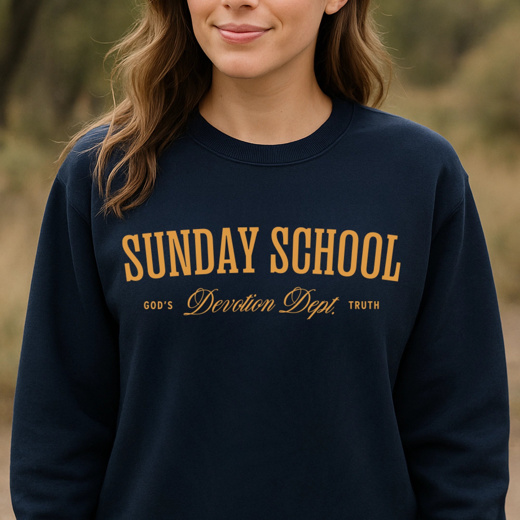 Christian crewneck sweatshirt with the phrase “Sunday School Devotion Dept. – God’s Truth” in varsity-style lettering; cozy unisex cotton-poly blend for faith-based everyday wear.