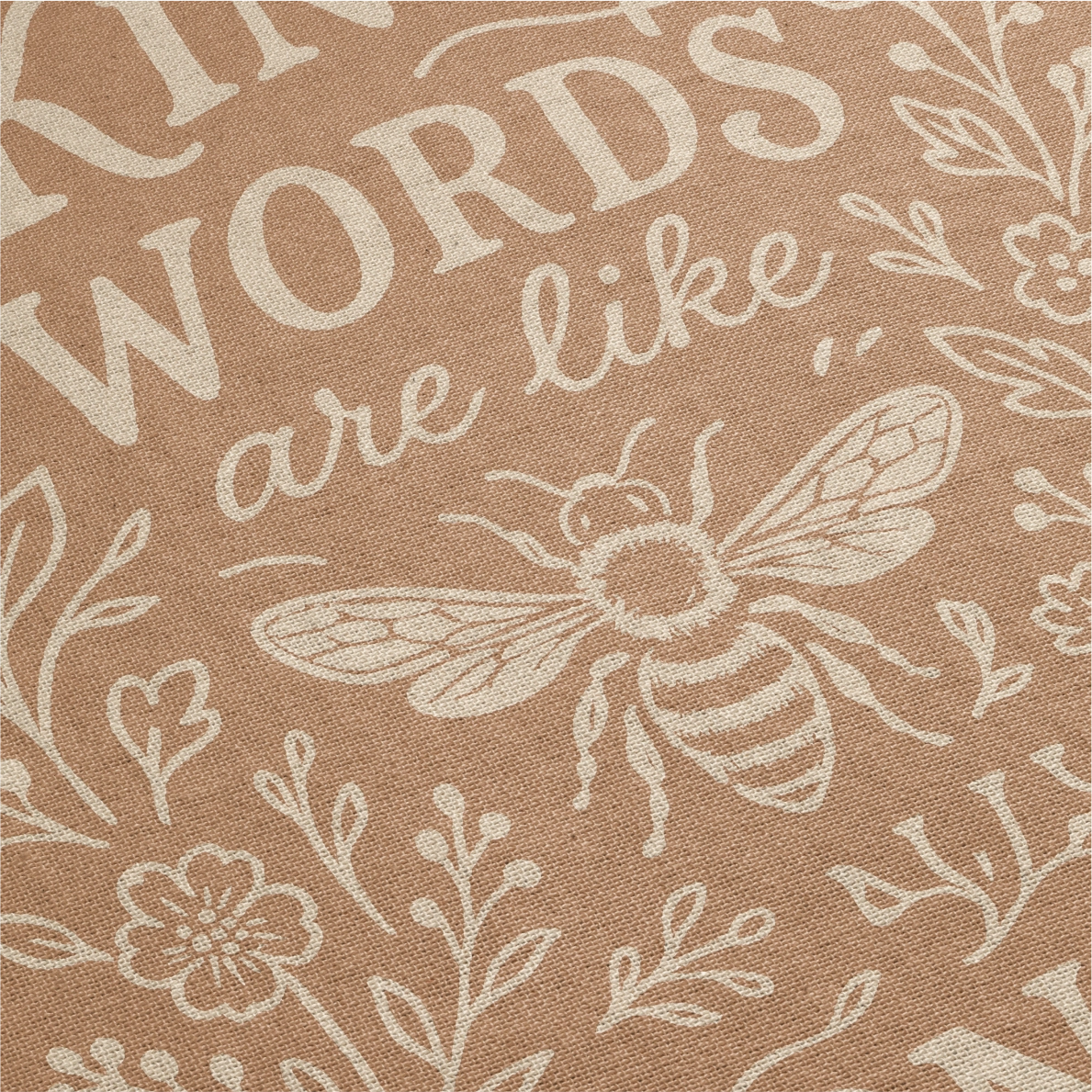 Warm-toned woven blanket with the phrase “Kind words are like honey,” floral accents, and a honey bee; 100% cotton with fringe, perfect for Christian gifting and home decor.