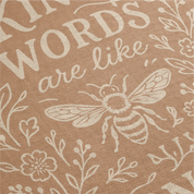Warm-toned woven blanket with the phrase “Kind words are like honey,” floral accents, and a honey bee; 100% cotton with fringe, perfect for Christian gifting and home decor.