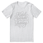 Christian t-shirt with hand-lettered “Kind words are like honey” design inspired by Proverbs 16:24; unisex soft cotton faith-based shirt for encouragement and everyday kindness.