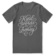 Christian t-shirt with hand-lettered “Kind words are like honey” design inspired by Proverbs 16:24; unisex soft cotton faith-based shirt for encouragement and everyday kindness.