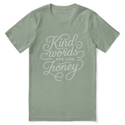 Christian t-shirt with hand-lettered “Kind words are like honey” design inspired by Proverbs 16:24; unisex soft cotton faith-based shirt for encouragement and everyday kindness.