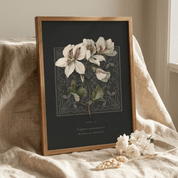 John 1:5 print in a wood frame resting on linen with dried flowers — bible verse wall decor styled setting
