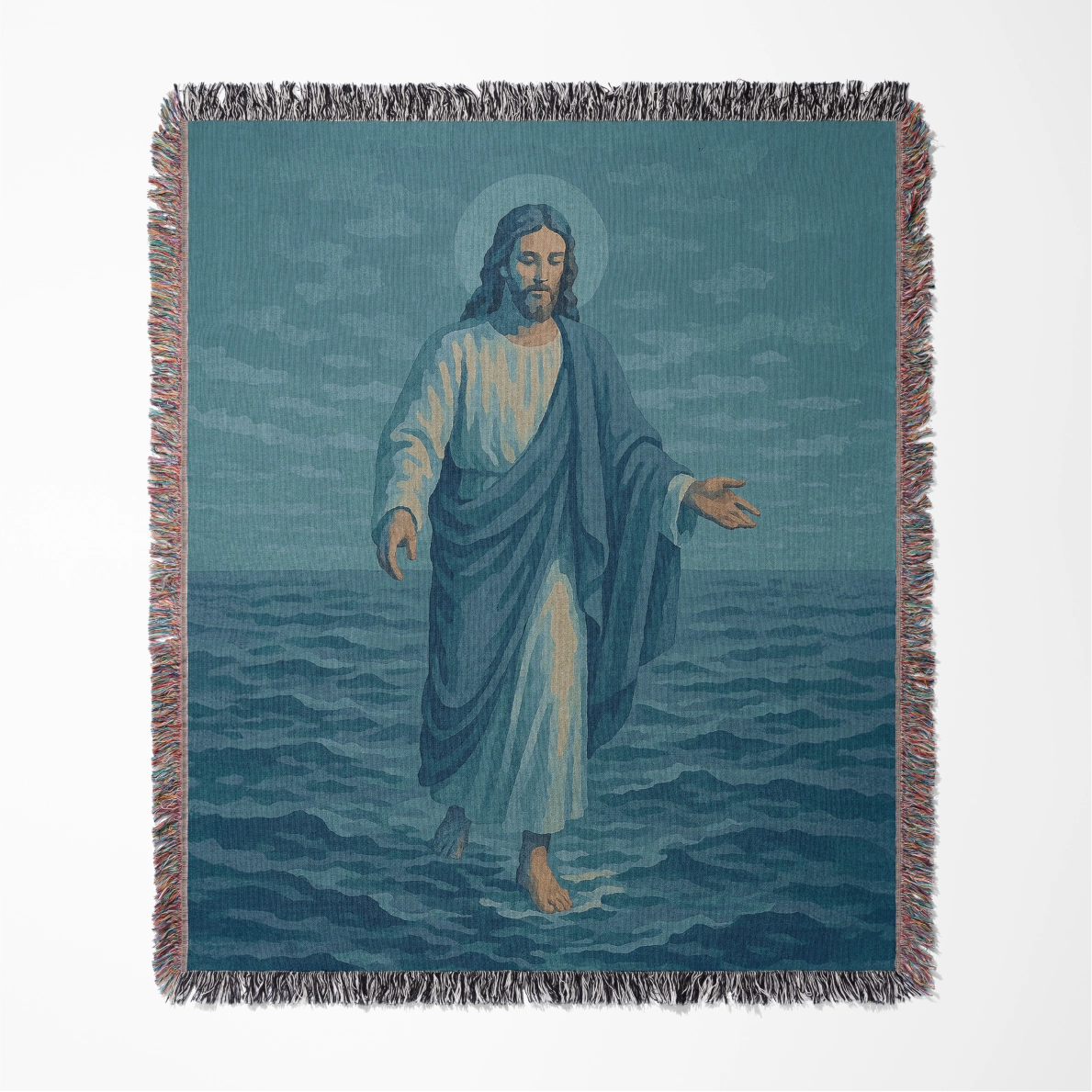 Woven Christian blanket depicting Jesus walking on water, made of 100% cotton with colorful fringe; perfect for home decor, prayer spaces, or faith-based gifts.