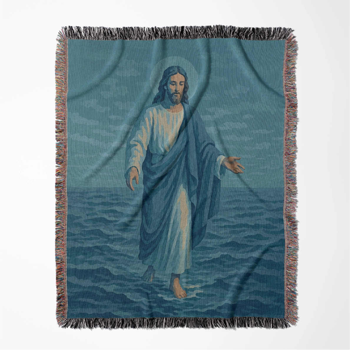 Woven Christian blanket depicting Jesus walking on water, made of 100% cotton with colorful fringe; perfect for home decor, prayer spaces, or faith-based gifts.